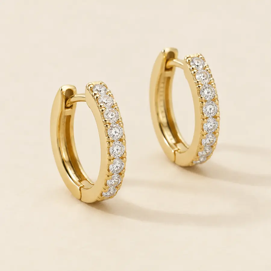 Diamond huggie hoop earrings in yellow gold